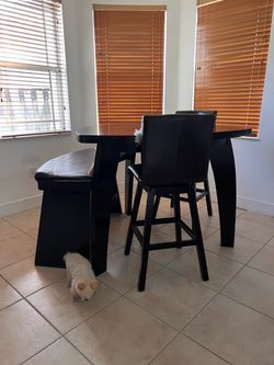 Dining room table with chairs