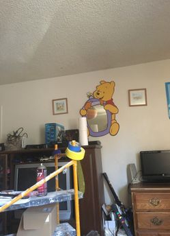 Winnie the Pooh mirror with 4 pictures