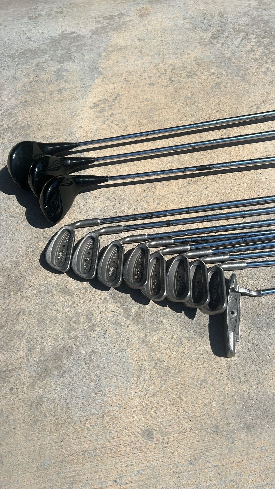 Ping black dot Golf Clubs.