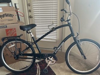 Townie, men’s black bicycle , adjustable leather seat,