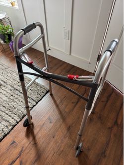 Front wheeled rolling walker