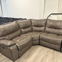 REAL LEATHER COUCH WITH ELECTRIC LEG REST!! WORKS AND IS FLUFFY NO SINKING PARTS!