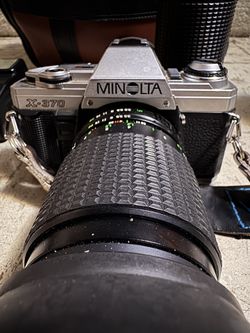 Minolta X-370 35mm SLR Film Camera With A Standard Minolta MD Manual Focusing Zoom Lens And A Bunch Of Accessories 