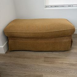 Set Of 2 Gold Rolling Ottomans 