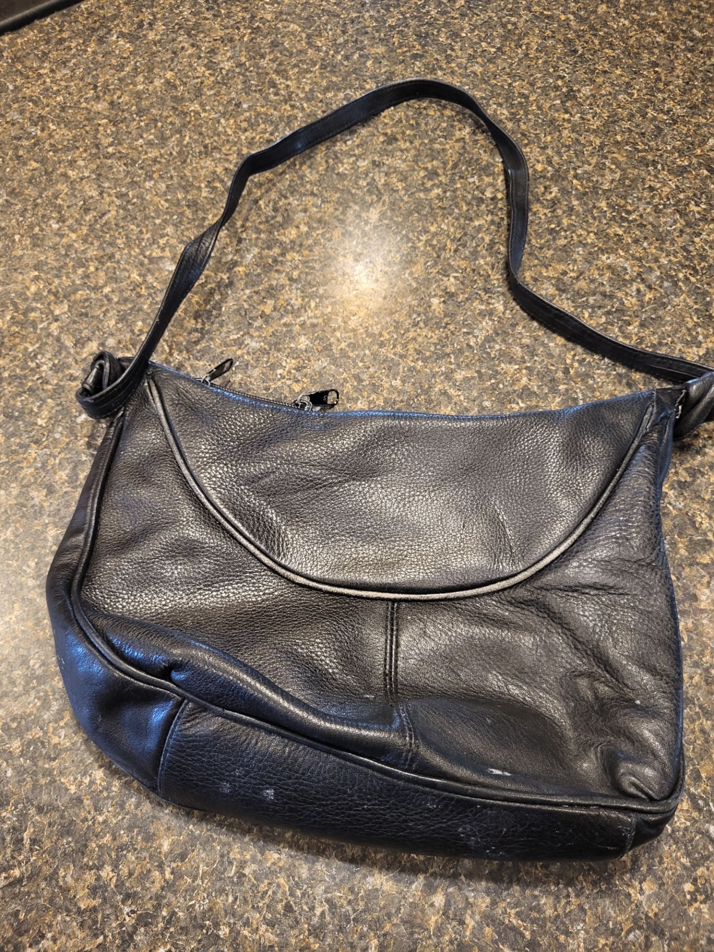 Purse black front flap single strap genuine leather tag inside 8x12"