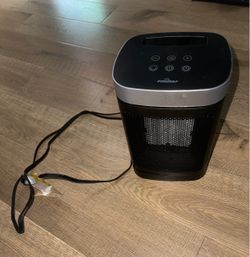 Black and grey mini portable indoor heater