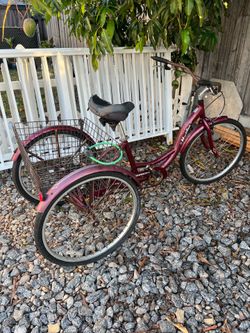 three-wheeled bicycle.