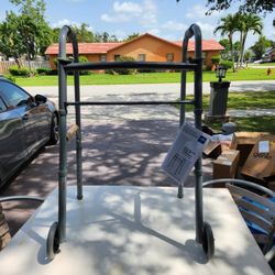 Brand New Folding Walker, Two Button with 5" Wheels read description for details see pictures 