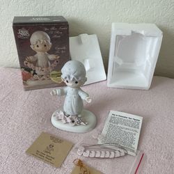 Precious Moments “You Have Touched So Many Hearts” figurine