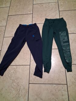 Boy pants size 10-12 in good condition clean both for 8