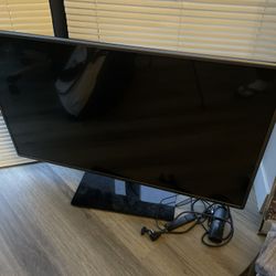 40” LG TV WITH STAND and ROKU