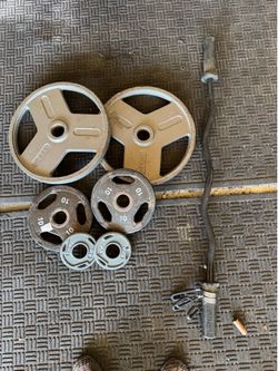Olympic weights 115lbs total plus curl bar with clamps