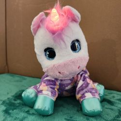 This is a FurReal Sweet Jammiecorn Unicorn Interactive Plush Light-Up Toy.