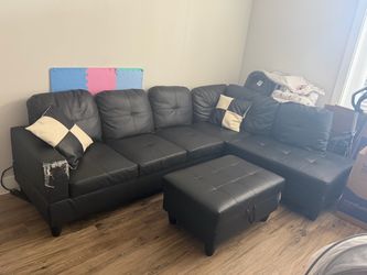 Black Faux Leather Sectional Sofa with Ottoman