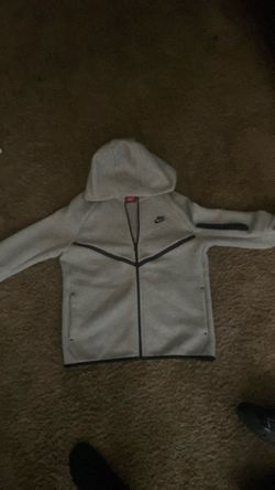 Small grey Nike tech