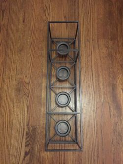 Cast iron candle holder