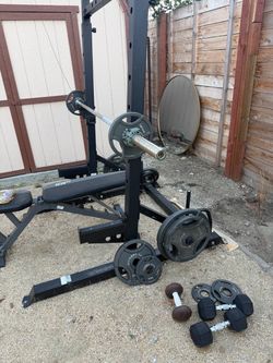 Weight rack with weights and bar