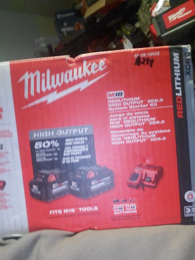 Milwaukee 2 6amp hour batteries and charger