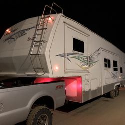 37’ Fifth Wheel Toy hauler RV Trade 4 Smaller 