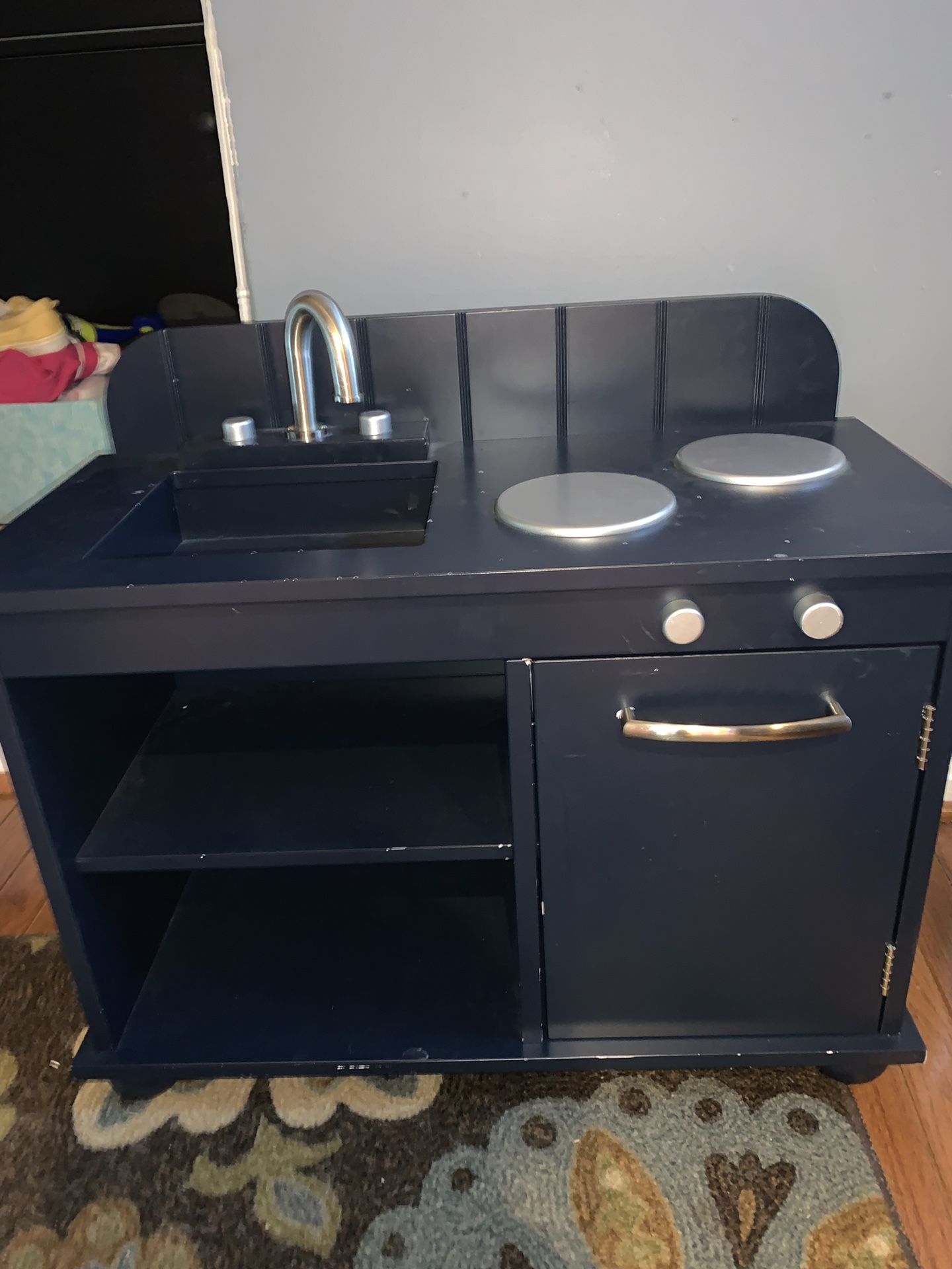 Small wooden play kitchen