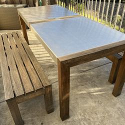 Rectangular Stainless Steel Table With Teak Legs And 2 Matching Teak Benches  Located in concord  Solid construction  No damages whatsoever   Table me