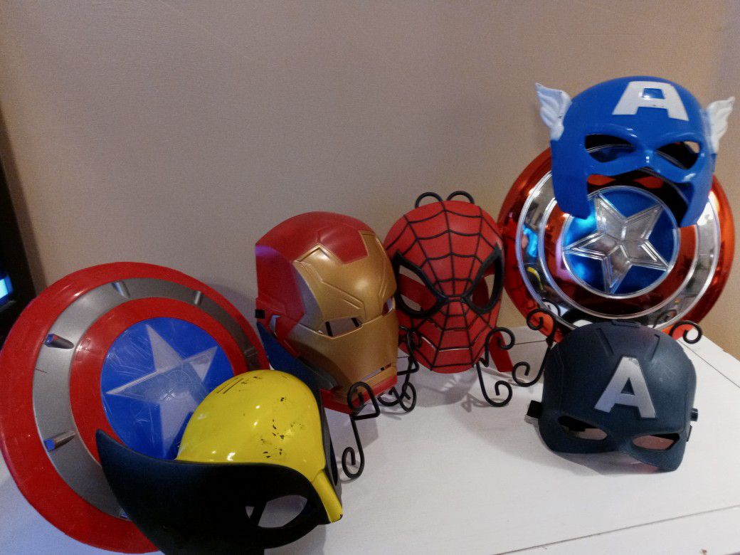 Lot of 7. Five Marvel Super Hero Masks and Two Captain America shields