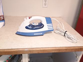 Clothing iron and steamer