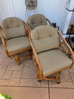 Tommy Bahama Rolling Rattan Chairs.
