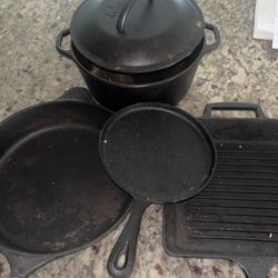 Cast Iron Pans And Pot With Lid