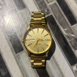 Gold Nixon Watch