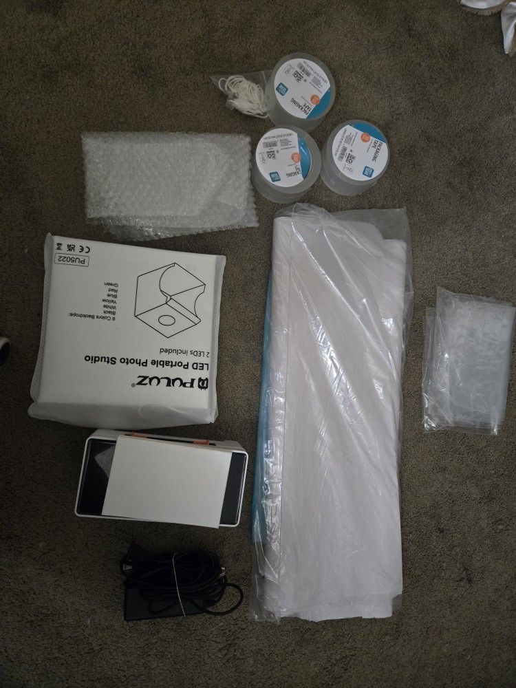 Label Printer And Extra Shipping Supplies.