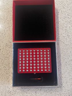 Christian Loubuton Red Studd Case 