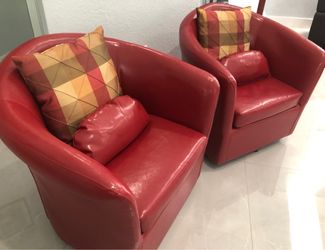 2 red contemporary barrel accent chairs