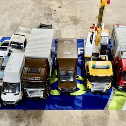  Variety Of Toy Cars, Trucks, Puzzles, Construction Rug, Nerf Guns 