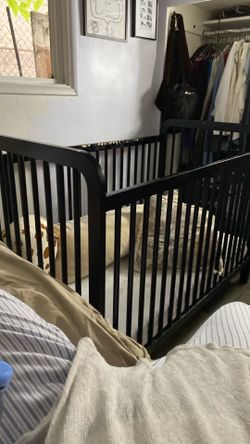 Black crib  , mattress not included