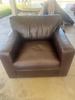 Crate and Barrel Leather Swivel chair