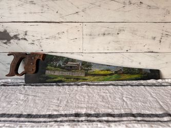 Vintage hand painted saw