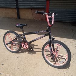 20 inch Mongoose Fling freestyle BMX bike with mag rims