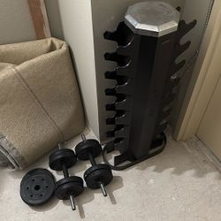 Dumbbell Rack And Some Plastic Weights