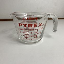 Vintage Pyrex Clear Glass, Red Markings Measuring 1 Cup, #508, Corning NY USA.  In good condition no chips or cracks just stains on the inside bottom 