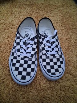 Black and  white checkered vans