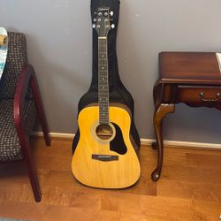 $100 Silvertoue Guitar 