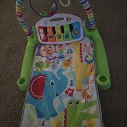 Fisher-Price Deluxe Kick N Play Piano Gym