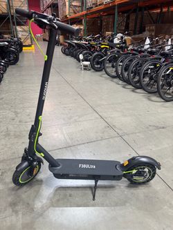 Front and rear shock-absorbing electric scooters