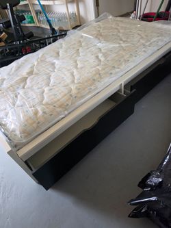Twin bed with mattress
