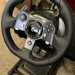 Logitech G920 Driving Force Racing Wheel and Floor Pedals, Real Force Feedback, Stainless Steel Paddle Shifters, Leather Steering Wheel Cover for Xbox