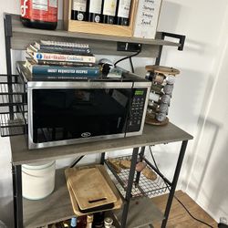 SUNLEI Kitchen Bakers Rack with Power Outlet, Large Microwave Stands Cart with 6 S-Shaped Hooks, Coffee Bar Cabinet, Kitchen Cart with Wine Glass Hold