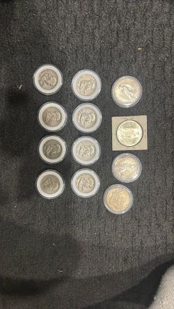 Half Dollars And Peace Dollars