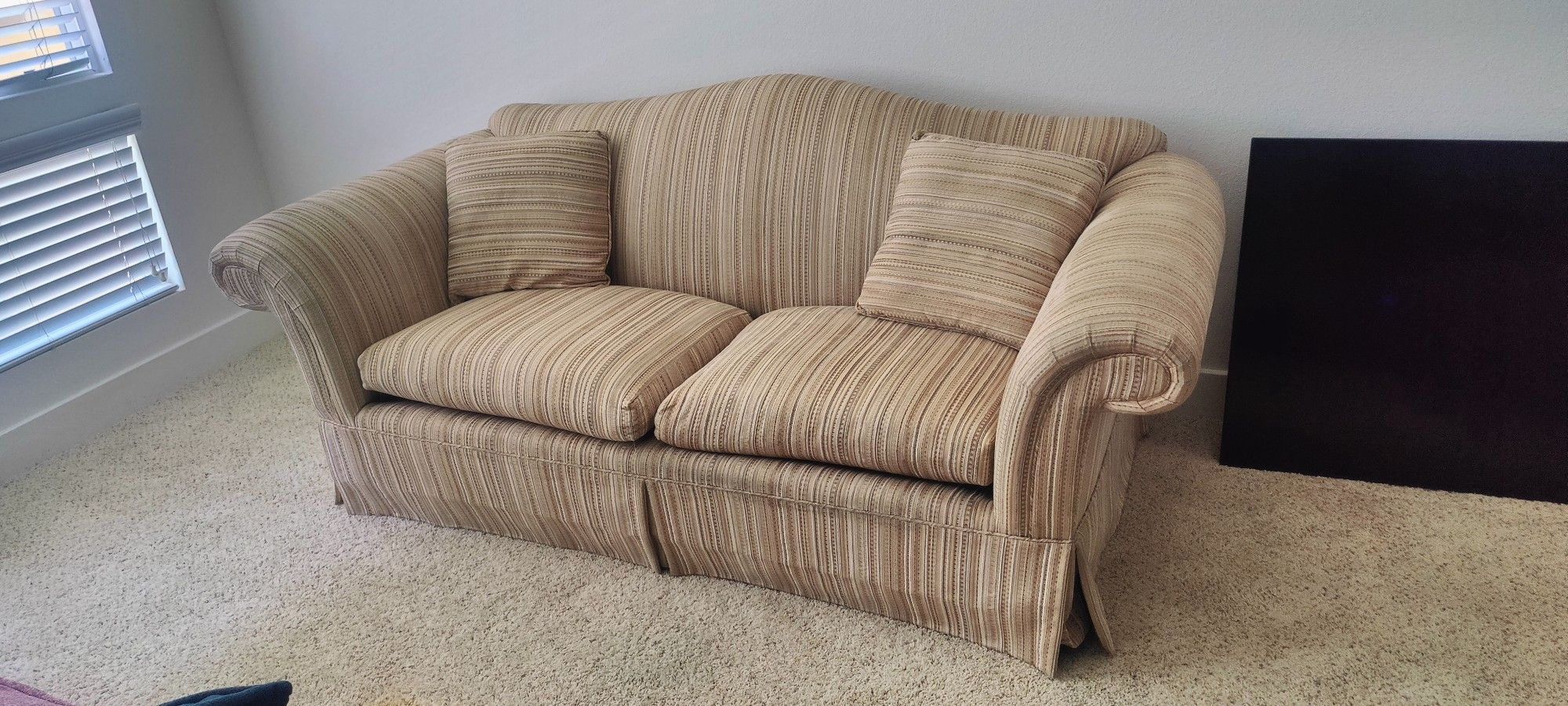 Nice Tan Couch With Line Design.