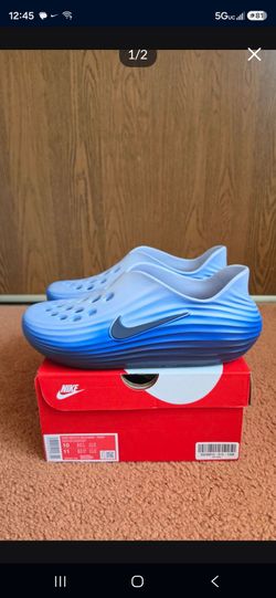 Size 10  nike reactx rejuven8 midnight navy